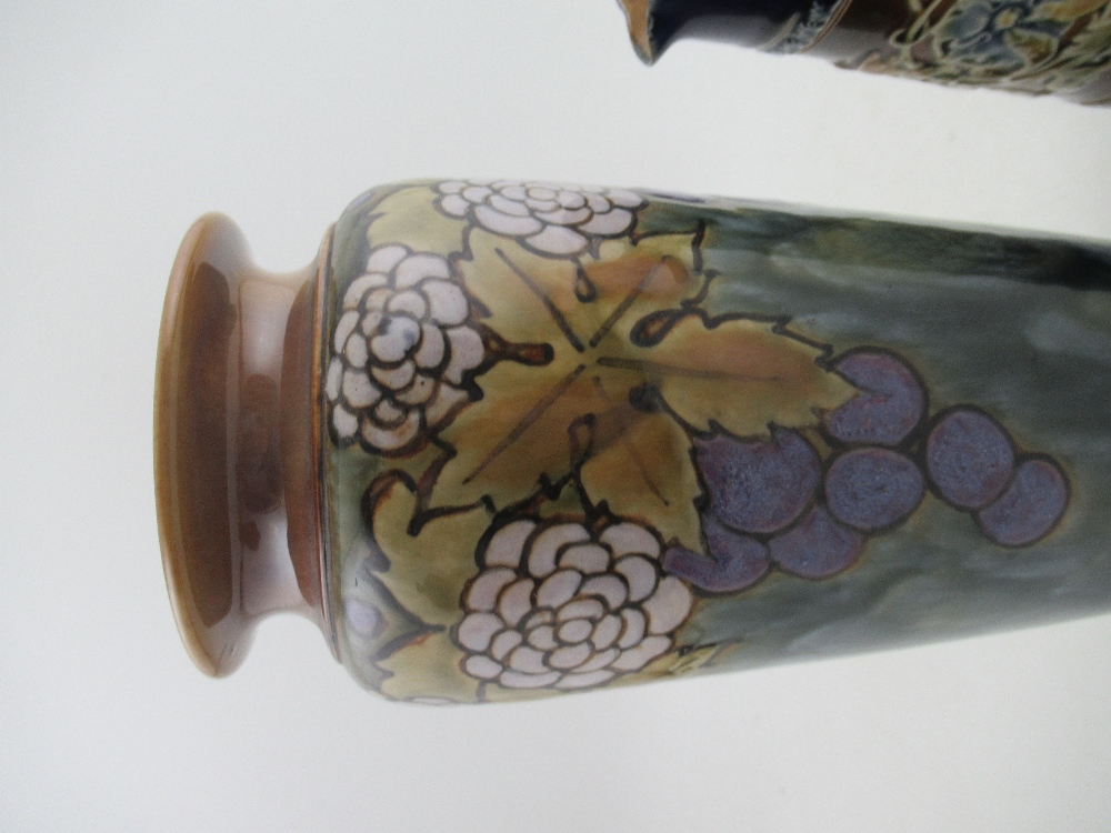 A Royal Doulton stoneware vase, decorated with a grape vine, height 12ins, together with a Doulton - Image 2 of 5