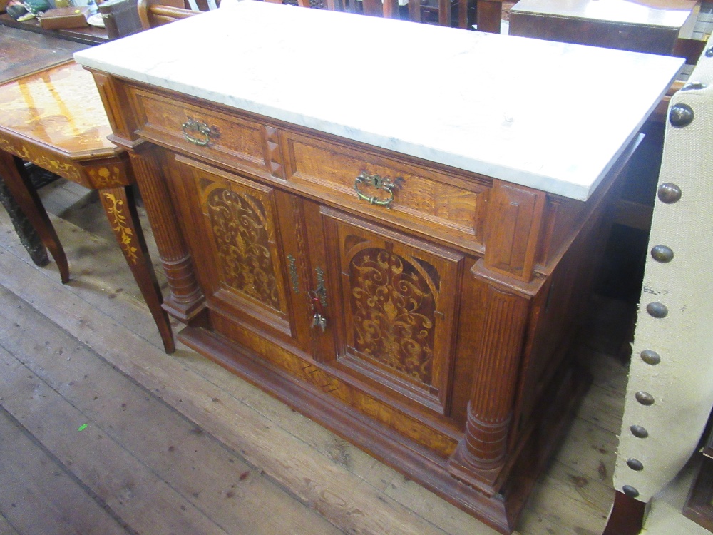 A continental style marble top side board fitted frieze drawer over 3 cupboard drawers with inlaid