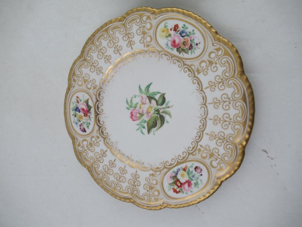 A Grainger's Worcester plate decorated with panels of flowers to a gilt boarder diameter 9.25 - Image 2 of 5