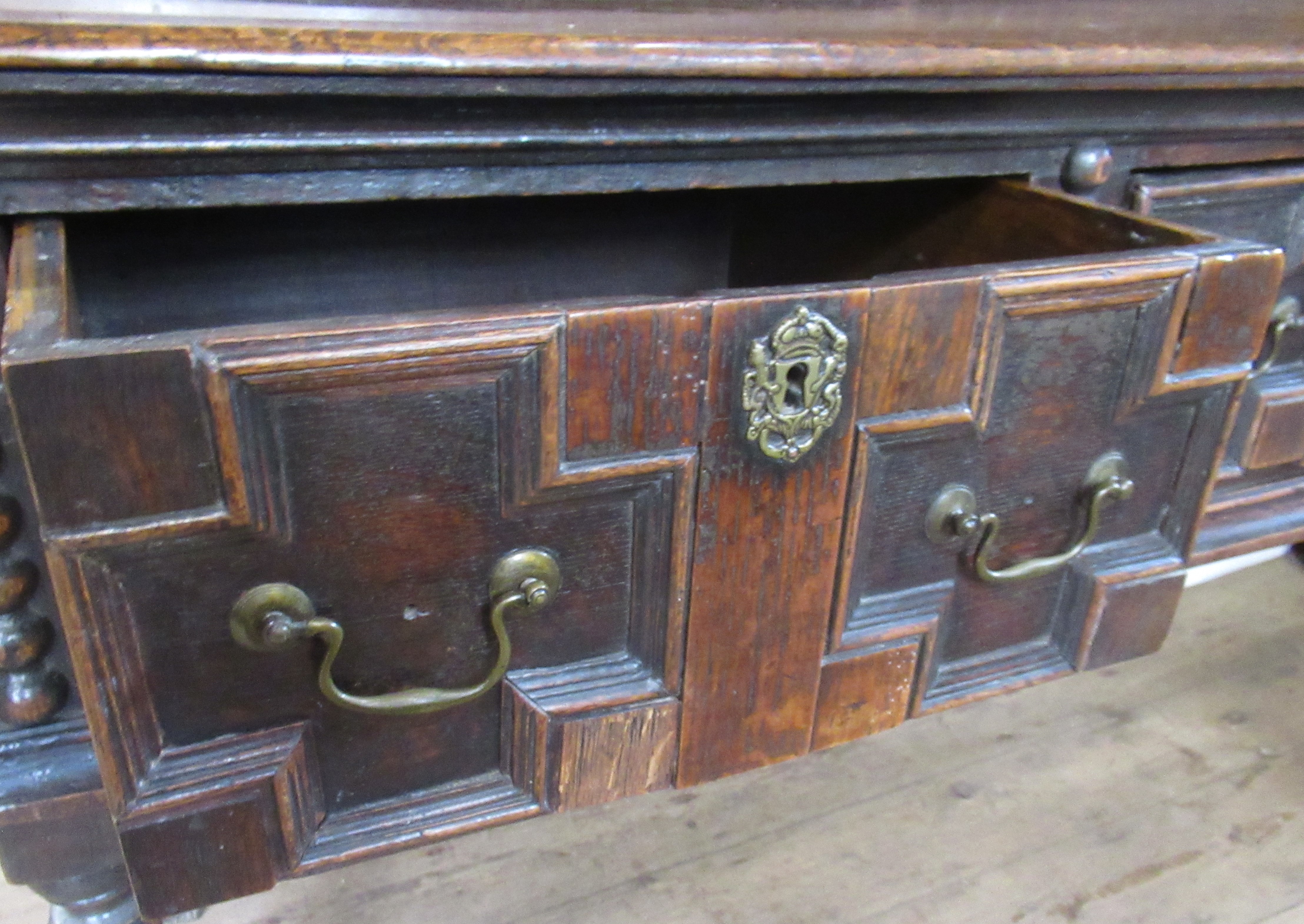 An Antique oak dresser, with boarded plate rack over, the base having moulded drawer fronts, width - Image 6 of 8