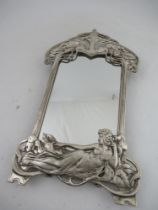 An Art Nouveau WMF metal framed dressing table mirror, decorated with a girl, scroll and flowers,