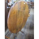 A Victorian walnut loo table, 47ins x 34ins