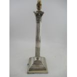 A silver plated Corinthian column table lamp, on stepped base, height 21ins