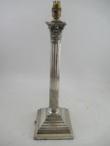 A silver plated Corinthian column table lamp, on stepped base, height 21ins