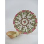 A Royal Worcester plate decorated with foliage to a lattice pink boarder diameter 9ins together with