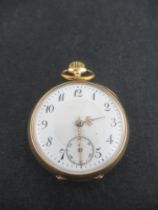 A 14K yellow gold fob watch , stamped '8442', engraved , monogram to reverse, weight 24g