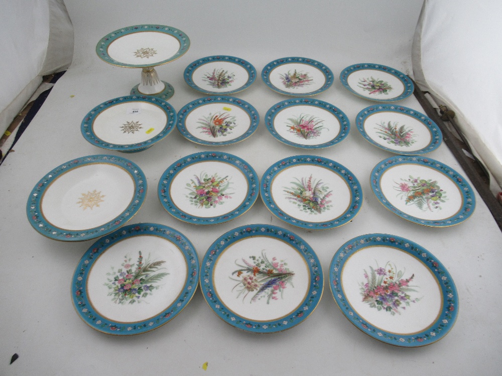 A Royal Worcester dessert service, the twelve plates decorated with floral sprays, with two low