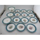 A Royal Worcester dessert service, the twelve plates decorated with floral sprays, with two low
