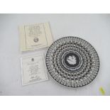 A Wedgwood Museum Series Trophy Plate, in white Jasper with black and cane decoration, after a
