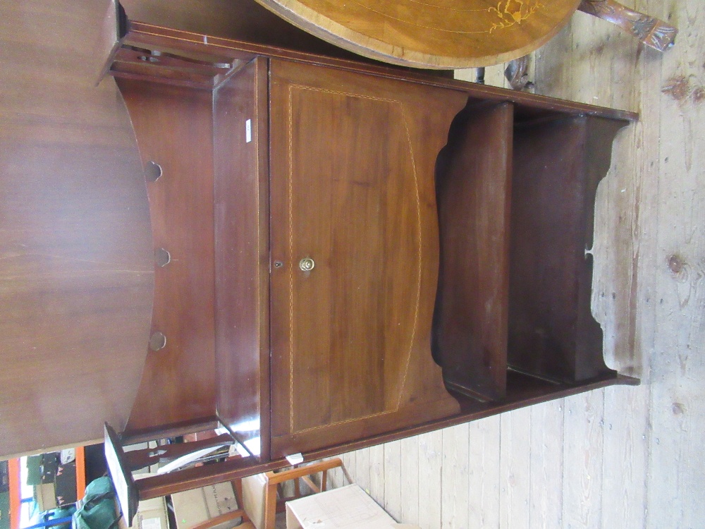 An Edwardian narrow bureau, with cross banded decoration, the drop flap revealing drawers and pigeon