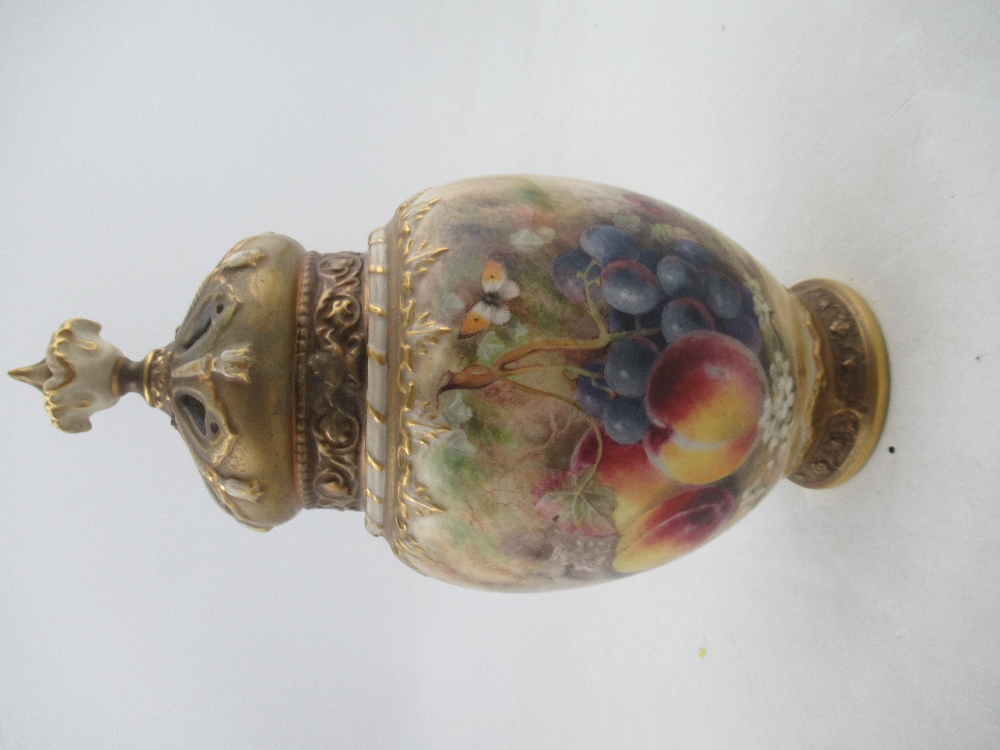 A Royal Worcester crown top pot pourri decorated half round with hand painted fruit by Ricketts,