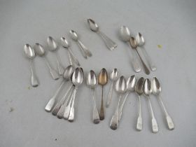 A collection of silver flatware, to include fiddle pattern tea spoons, weight 15oz
