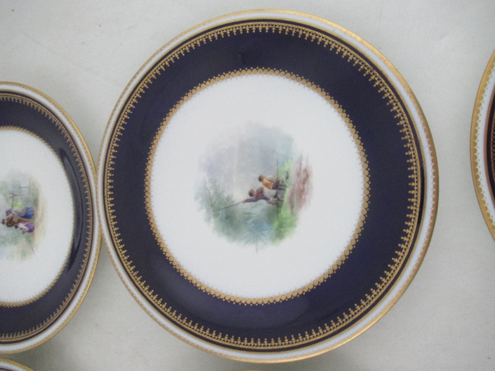 Six Grainger Worcester plates decorated with central panels of figures in a landscape to a deep blue - Image 3 of 9