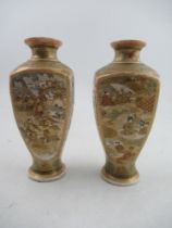 A pair of Satsuma vases, decorated with panels of figures, height 6ins Condition Report: Chip to the