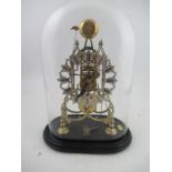 Skeleton Clock with pierced silver Chapter Ring twin chain under a glass dome