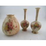 A pair of Royal Worcester blush ivory vases decorated with flowers together with a Royal Worcester