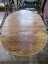 An Antique oak gate leg table, width 33ins