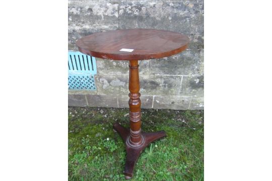 An mahogany circular occasional table, raised on turned column terminating in triform base, diameter - Image 1 of 3