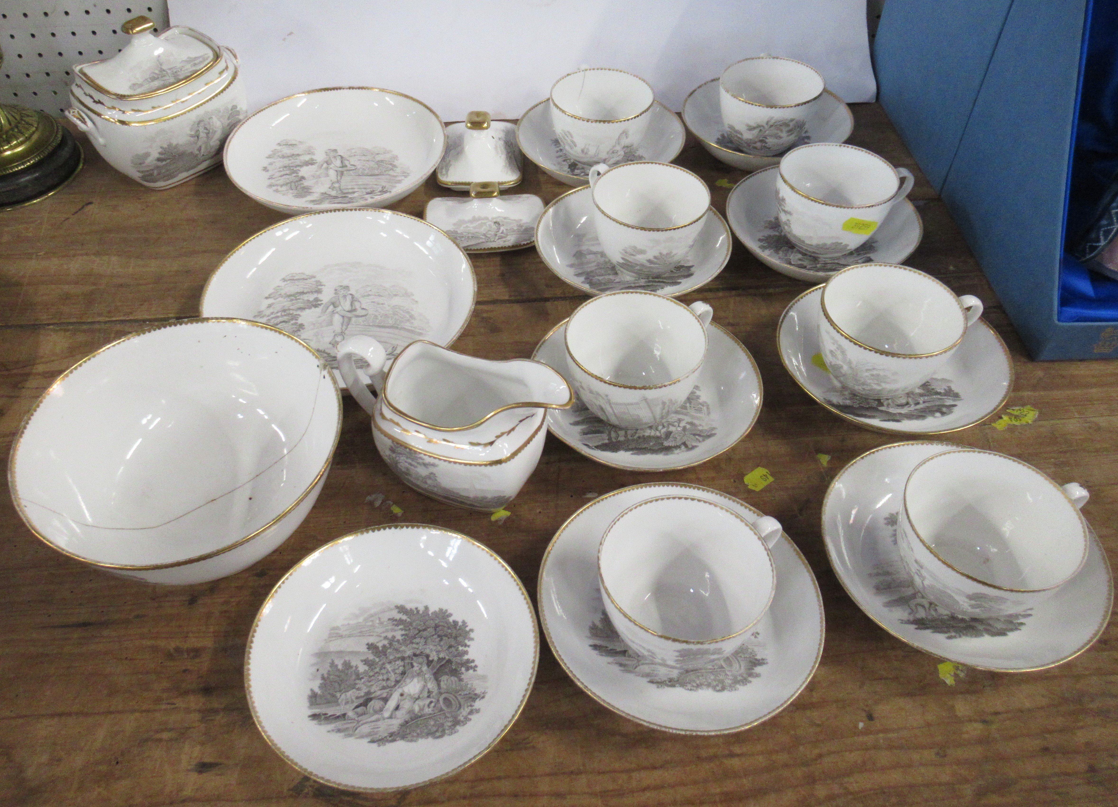 A 19th century Spode porcelain part tea service, decorated in grey with figures in various scenes,