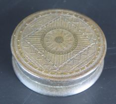 A 19th century continental circular tortoiseshell box with geometric gilded decoration, 6.5cm