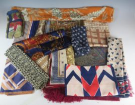 A collection of assorted ladies scarves, including printed silk and wool examples.