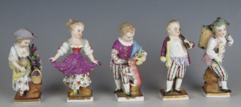 A set of five German porcelain figures, including grape and flower pickers, each approx 11cm high (