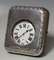 A goliath steel cased pocket watch with 6cm Roman dial with subsidiary seconds dial contained in a