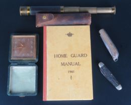 A reprinted Home Guard Manual for 1941, a brass three draw and leather bound telescope, two