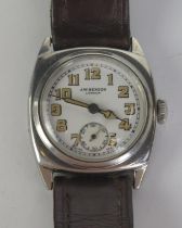 A 1930's J.W. Benson Steel Cased Wristwatch, 29mm case with enamel dial. Winds and runs