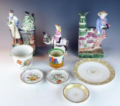 A pair of Rye Pottery figures, 'Lady Gardiner' and 'Gardiner', together with a girl on a pony, a