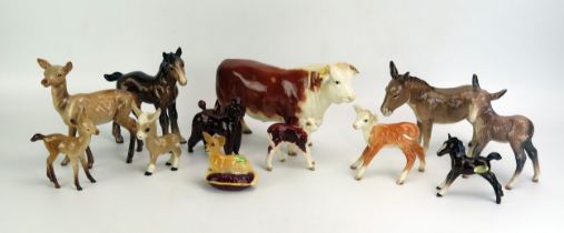 A collection of assorted Beswick animals, includes a Chihuahua, poodle, donkey, calf, foals, hind