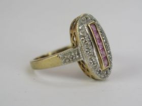 A 9ct Gold, Pink Sapphire and Diamond Dress Ring, 16.6x10mm head, hallmarked, size I.5, 3.32g
