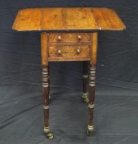 A 19th century oak side table, the top with two hinged leaves, and two short drawers, raised on ring