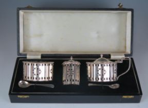 An Elizabeth II silver three-piece condiment set, maker Crisford & Norris Ltd, Birmingham, 1973/