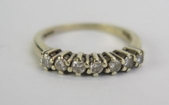 A 9ct White Gold and Diamond Half Eternity Ring, continental marks, .33ct, size K.5, 2.52g