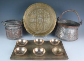 Two Indian copper swing-handled pots, a brass rectangular tray metal finger bowls, and a circular