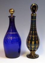 A 19th century blue glass brandy decanter and stopper, of ovoid form with gilt decoration, 22cm high