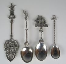 Four assorted Dutch and continental silver spoons, with ship, windmill and other decoration, total