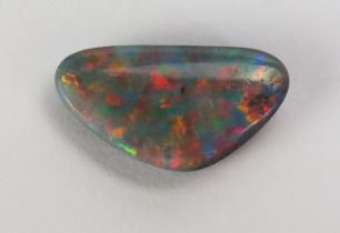 A Black Fire Opal Polished Specimen, 16.7x9.1mm, .78g. We are not certain this is a singlet