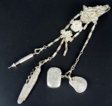 *WITHDRAWN* A silver plated chatelaine with three chain suspensions with pen knife, aide memoire