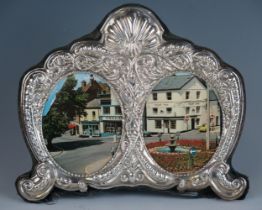 An Elizabeth II silver double photograph frame, maker Carrs of Sheffield, 1996, 15 x 18cm.