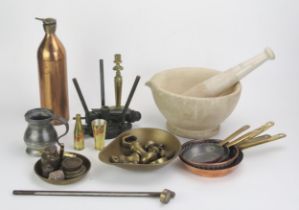 A stoneware mortar and pestle, assorted brass weights, thermometer, five miniature brass and
