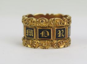 A William IV Gent's 18ct Gold and Enamel Memorial Ring with ten black panels spelling "IN MEMORY OF"
