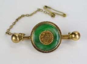 A Chinese 18K Gold and Jadeite Brooch, marked TC18, 39.8mm, 4.69g