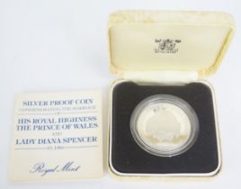 A Royal Mint Sterling Silver Prince Charles and Lady Diana Spencer 1981 Coin. Boxed with COA