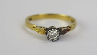 An 18ct Gold and Diamond Solitaire Ring, c. 3.2mm brilliant cut illusion set stone, Sheffield