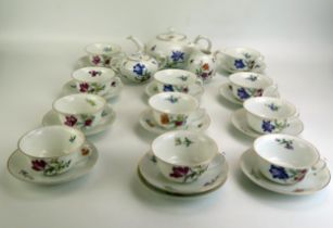 A Rosenthal porcelain part tea service with polychrome iris and convolvulus pattern decoration,