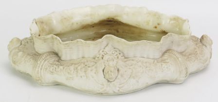 A late Victorian Parian porcelain table centrepiece, of cartouche-shaped outline, with cherub and