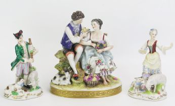 A pair of continental porcelain figures of shepherd and shepherdess, 16cm high, together with a