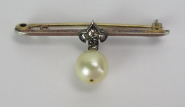 An Antique 15ct Gold, untested Pearl and Old Cut Diamond Brooch set with four stones in a fleur-de-